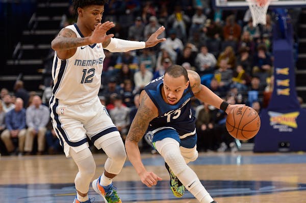 Timberwolves guard Shabazz Napier (13) entered Tuesday’s game against the Grizzlies having scored 20 or more points in four consecutive games, but o