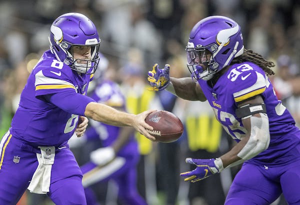 Vikings quarterback Kirk Cousins handed the ball off to Dalvin Cook in overtime Sunday in New Orleans. The Vikings offense has been at its best this s