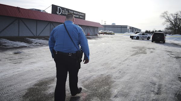 Spring Lake police officers investigated the scene of a shooting at the Dala Thai Restaurant and Banguet Hall in Spring Lake Park on Sunday, Dec. 23, 