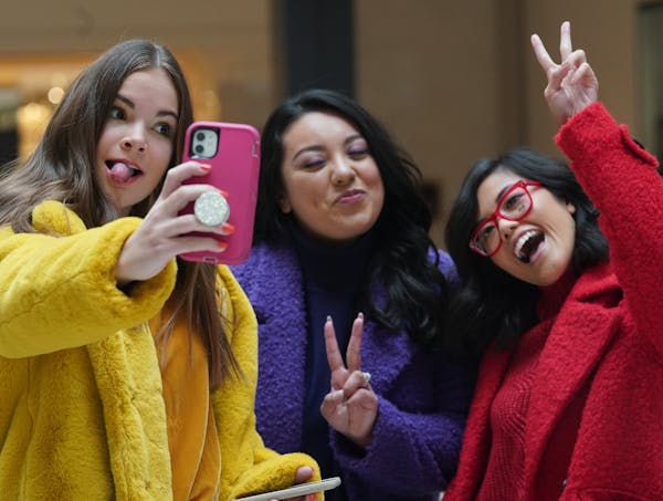 Influencers Eva Igo, Andrea Peña and Cindi Yang posed for a selfie during a photo shoot for the Rosedale holiday campaign.