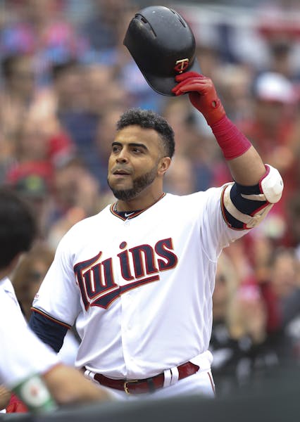 Twins designated hitter Nelson Cruz acknowledged the crowd at Target Field after hitting his 400th career home run on Sept. 22.