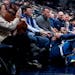 Wolves guard Josh Okogie fell into the front row after making a three-pointer in the second quarter of a 107-100 loss to the Nuggets on Monday night.