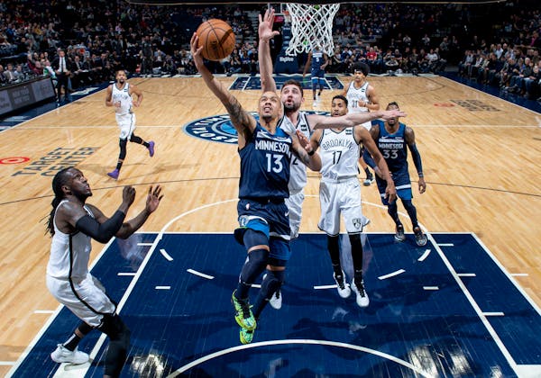 Wolves guard Shabazz Napier drove the lane for two of his 24 points in a 122-115 overtime victory over the Brooklyn Nets at Target Center on Monday.
