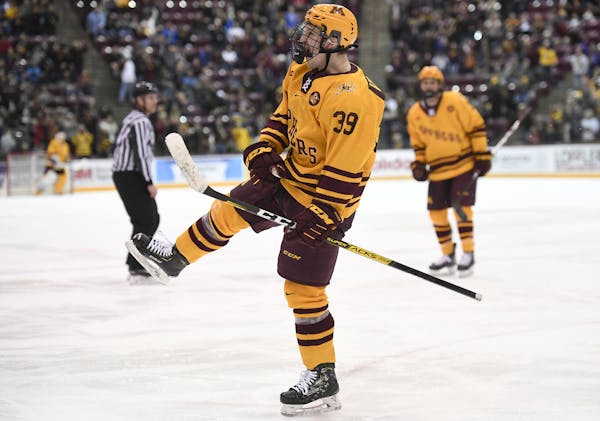 Gophers forward Ben Meyers celebrated his third period goal in last Saturday’s victory against Ohio State.