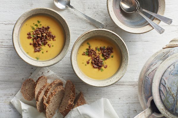 Crushed gingersnaps and pecans combine to make a tasty topping for Roasted Butternut Squash Ginger Soup