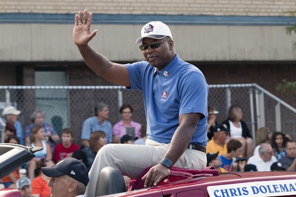 Vikings great Chris Doleman rode in the 2015 Pro Football Hall of Fame Grand Parade in downtown Canton, Ohio, three years after his induction.