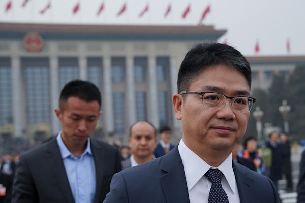 CEO of JD.com Richard Liu Qiangdong arrives at the Great Hall of the People to attend the opening ceremony of the Chinese People's Political Consultat