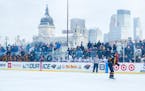 Against the backdrop of the Minneapolis skyline, players from Warroad and Minneapolis played their Hockey Day Minnesota game at Parade stadium. Warroa
