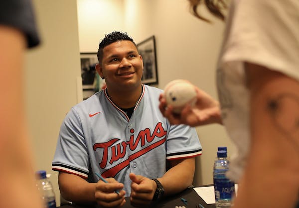 Twins pitcher Brusdar Graterol signed autographs during TwinsFest 2020 on Friday at Target Field.