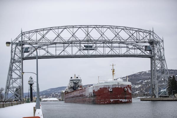 The USL Assiniboine pulled out of the Duluth Harbor through the Aerial Lift Bridge on November 13, 2019.