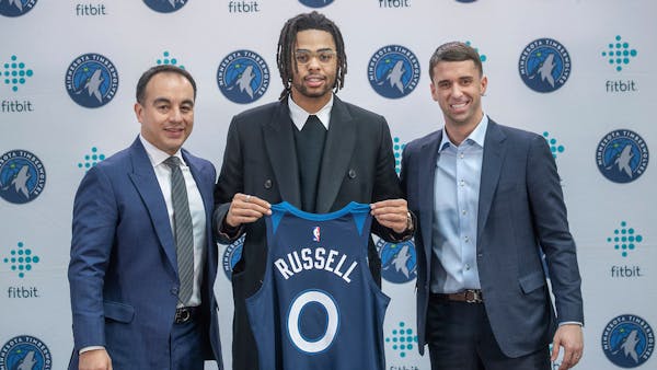 Wolves introduce Russell, other new players to fans and media