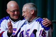 Jack O'Callahan, left, and Mark Pavelich of the 1980 U.S. ice hockey team talked during the "Relive the Miracle" reunion at Herb Brooks Arena on Satur