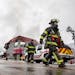 Firefighters from St. Cloud, Sartell and Sauk Rapids battle a major fire in downtown St. Cloud at the Press Bar and Parlor Monday, Feb. 17, 2020, at 5