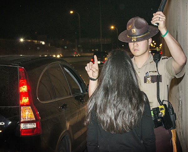 A state trooper conducted a field sobriety test on a driver.