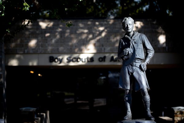A statue outside the national headquarters of the Boy Scouts of America in Irving, Texas, on Feb. 14, 2020. The Boy Scouts, an iconic presence in the 