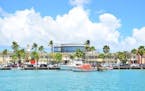 The capital of Aruba is Oranjestad, a colorful, cultural center with boats, shops, restaurants, and the iconic I Love Aruba sign.