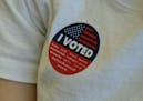 A voter wears an "I voted" sticker on the Super Tuesday, at a voting center in El Segundo, Calif., Tuesday, March 3, 2020.