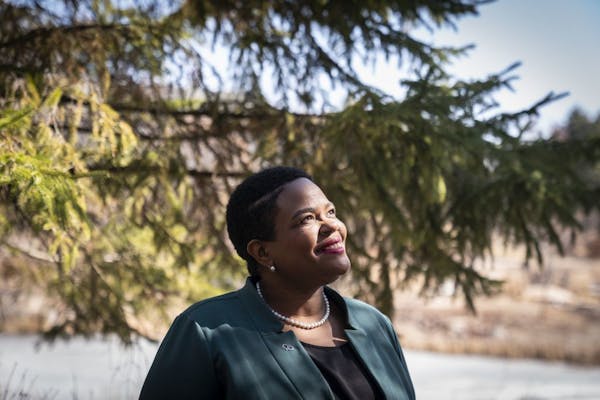 Cindy Kaigama, the health systems director for the Alzheimer's Association of Minnesota and Dakotas, posed for a portrait at Centennial Lakes Park in 
