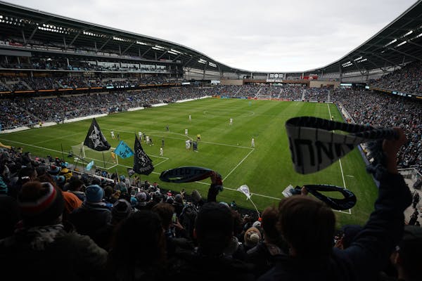 Minnesota United fans waved scarves at last April’s home opener at Allianz Field.