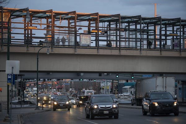 Traffic flowed on Lake Street under the LRT station in Minneapolis on Feb. 25, 2020.