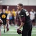 New offensive coordinator Mike Sanford Jr. during the first open Gopher football practice at the University of Minnesota in Minneapolis, Minn., on Fri
