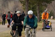 People flocked to Bde Maka Ska on April 1, despite officials urging social distancing. The Minneapolis Park Board barricaded three more parkways for u