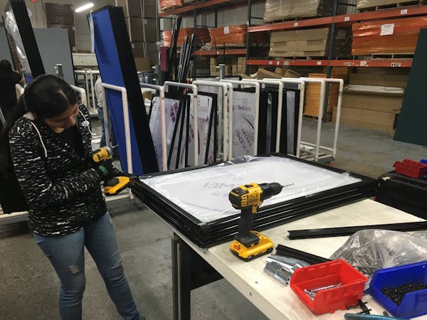 Versare Solutions in Minneapolis, a maker of room and cubicle partitions, has pivoted to making retail and reception room screens as the economy chang