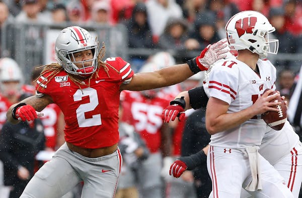 Ohio State defensive end Chase Young pressures Wisconsin quarterback Jack Coan on Oct. 26, a game the Buckeyes dominated. The teams meet again Saturda