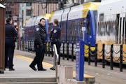 Metro Transit police dispersed a group of people after responding to a disturbance on a Green Line train outside Union Depot in St. Paul on March 28, 