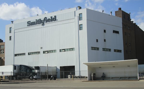 Smithfield said it will close its giant pork processing plant in Sioux Falls, S.D., shown in a photo taken Wednesday, where health officials reported 