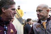 Gophers coach P.J. Fleck shook hands with Athletic Director Mark Coyle following a win over Illinois last season.