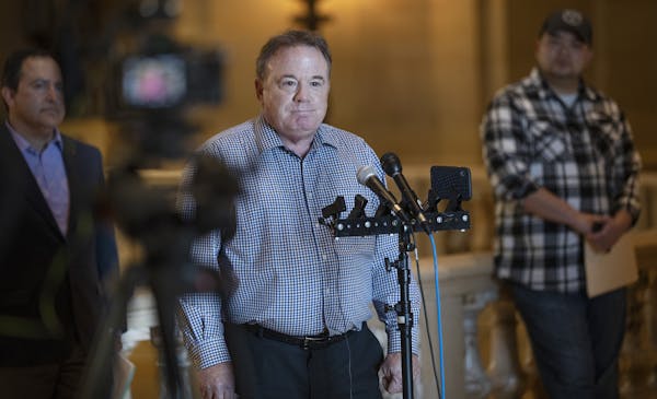 Mike Jennings, owner of Scoreboard Bar and Grill and other restaurants, spoke during a news conference Monday at the State Capitol in St. Paul in favo