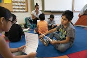 Miguel Leandro Stevens worked on a conversational exercise during an ESL class at Centennial Elementary School in Richfield, Minn., on Tuesday, May 7,