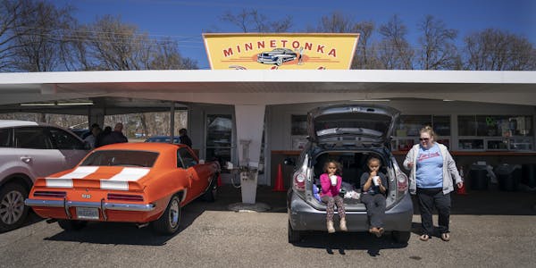Erica Morningstar with her two daughters Bryn Redding 5, and Brielle Redding, 8, enjoyed a root beer at the Minnetonka Drive In.