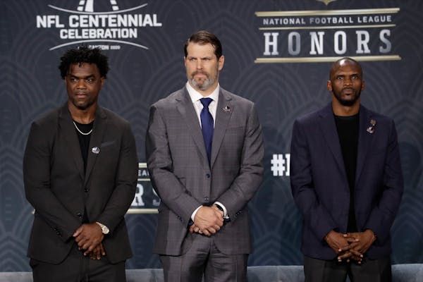 Hall of Fame Class of 2020, from left, Edgerrin James, Steve Hutchinson and Isaac Bruce pose at the NFL Honors on Feb. 1, 2020, in Miami.