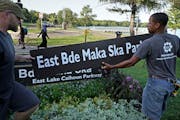 In August, Minneapolis park workers installed new placards to bestow the new lake name on the parkways surrounding while the fight played out in court
