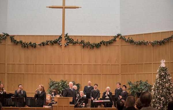 Members of the church sang during worship services at the Salvation Army Center in Maplewood in December 2017. Food, housing, emergency assistance and