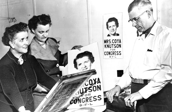 Coya Knutson, left, Alice Lindquist, and Andy Knutson, Coya’s husband, inspected a campaign poster in 1954.