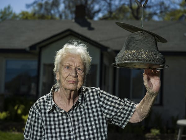 Nettie Thill hopes to age in place at her longtime home in Spring Lake Park, where she enjoys feeding the birds.