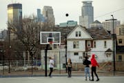A pickup basketball game at Peavey Field Park in Minneapolis on March 26. Officials were concerned about people not practicing social distancing.