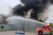 Minneapolis firefighters doused a large fire that torched a pawnshop early Friday morning just south of the Cedar-Riverside intersection.