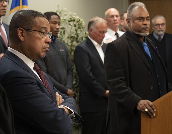 Minnesota Attorney General Keith Ellison left, and John Harrington, Minnesota Department of Public Safety commissioner, are key players urging action 