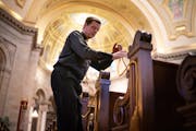 The Rev. John Ubel roped off two pews, leaving every third one open, according to a seating chart to evenly space 250 parishioners for this weekend’