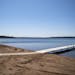 The beach on Gull Lake at Grand View Lodge sat empty on Monday. "It's really hard to see," Resort Manager Kevin Karau said.