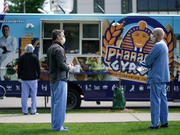 Doctors lined up during the lunch hour for Pharaoh’s Gyros food truck at the University of Minnesota Medical Center.