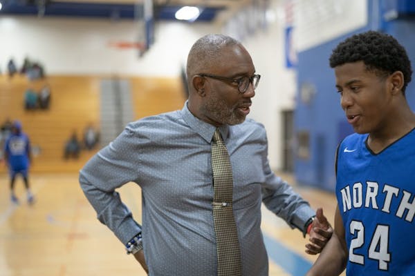 Coach Larry McKenzie gave instructions to North High's Willie Wilson during a game in 2019.