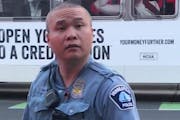 Former officer Tou Thao, videotaped on Chicago Avenue with George Floyd.