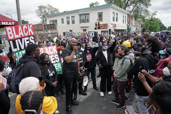 Peaceful protesters, including Actor and comedian Nick Cannon celebrated the memory of George Floyd and demanded justice outside the Cup Foods store o