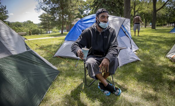 After Dennis Barrow was evicted earlier in the week from a former Sheraton hotel that had been turned into a shelter, he pitched a tent at Powderhorn 