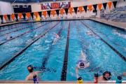 Members of the Farmington High School girls' swim team participated Monday in the first available day of summer workouts for high school athletes and 